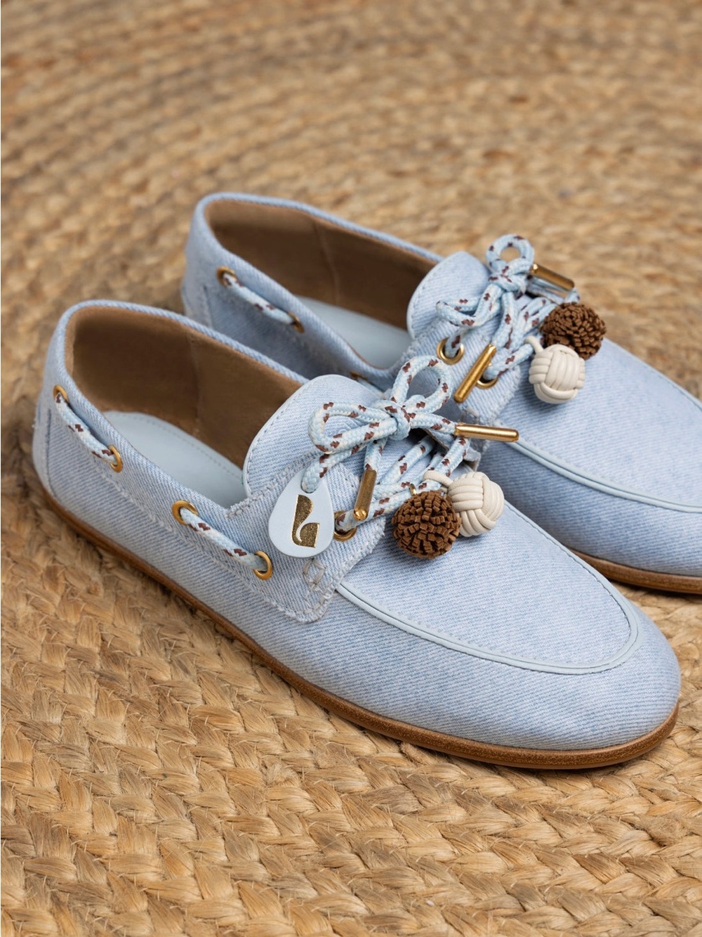 Larroude Light Blue Denim Slip-On Loafer with Brown Pom Accent